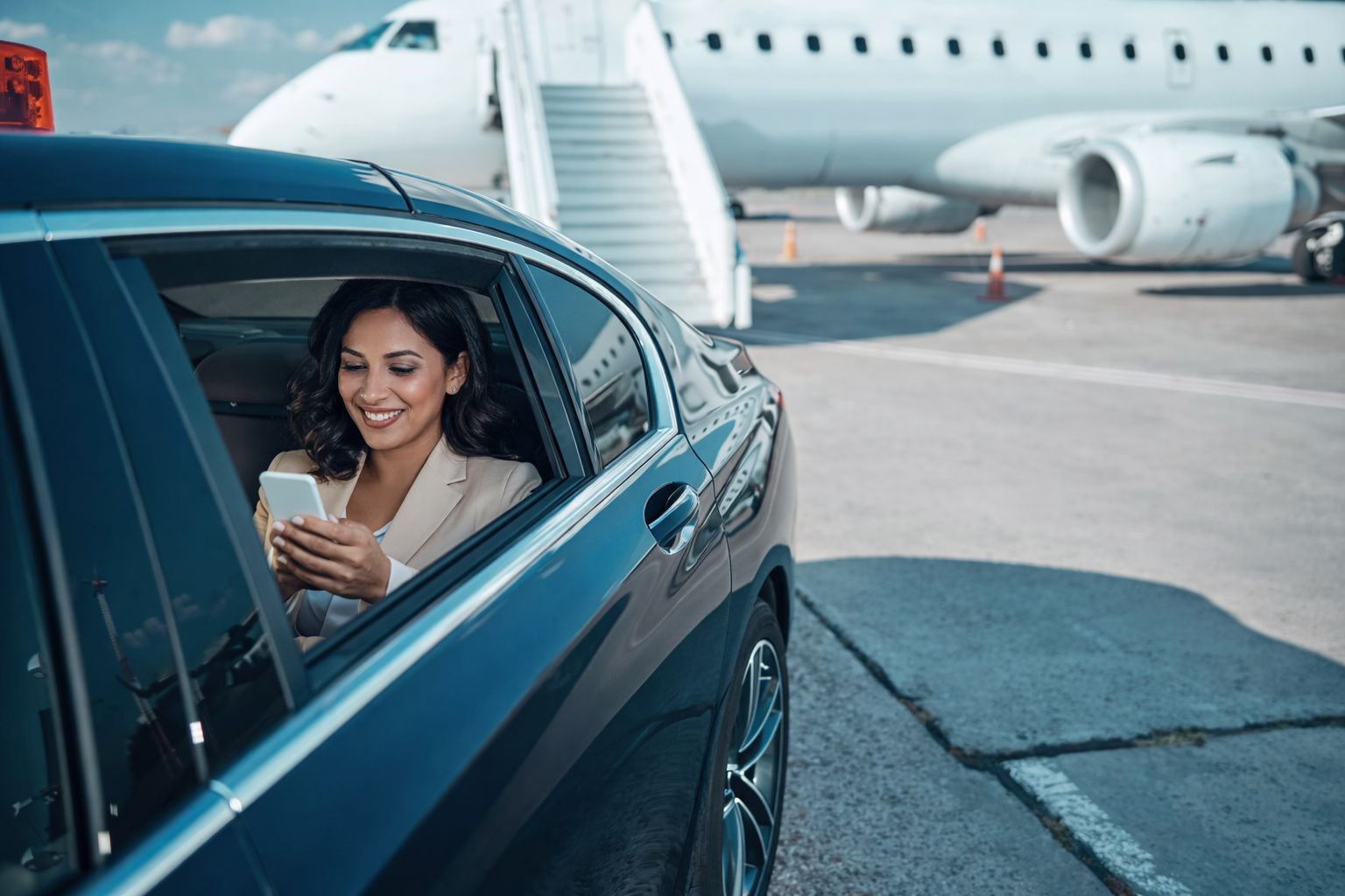 Luxury limo service at Boston Logan Airport terminal